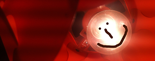 Glhlampe mit Smiley-Gesicht